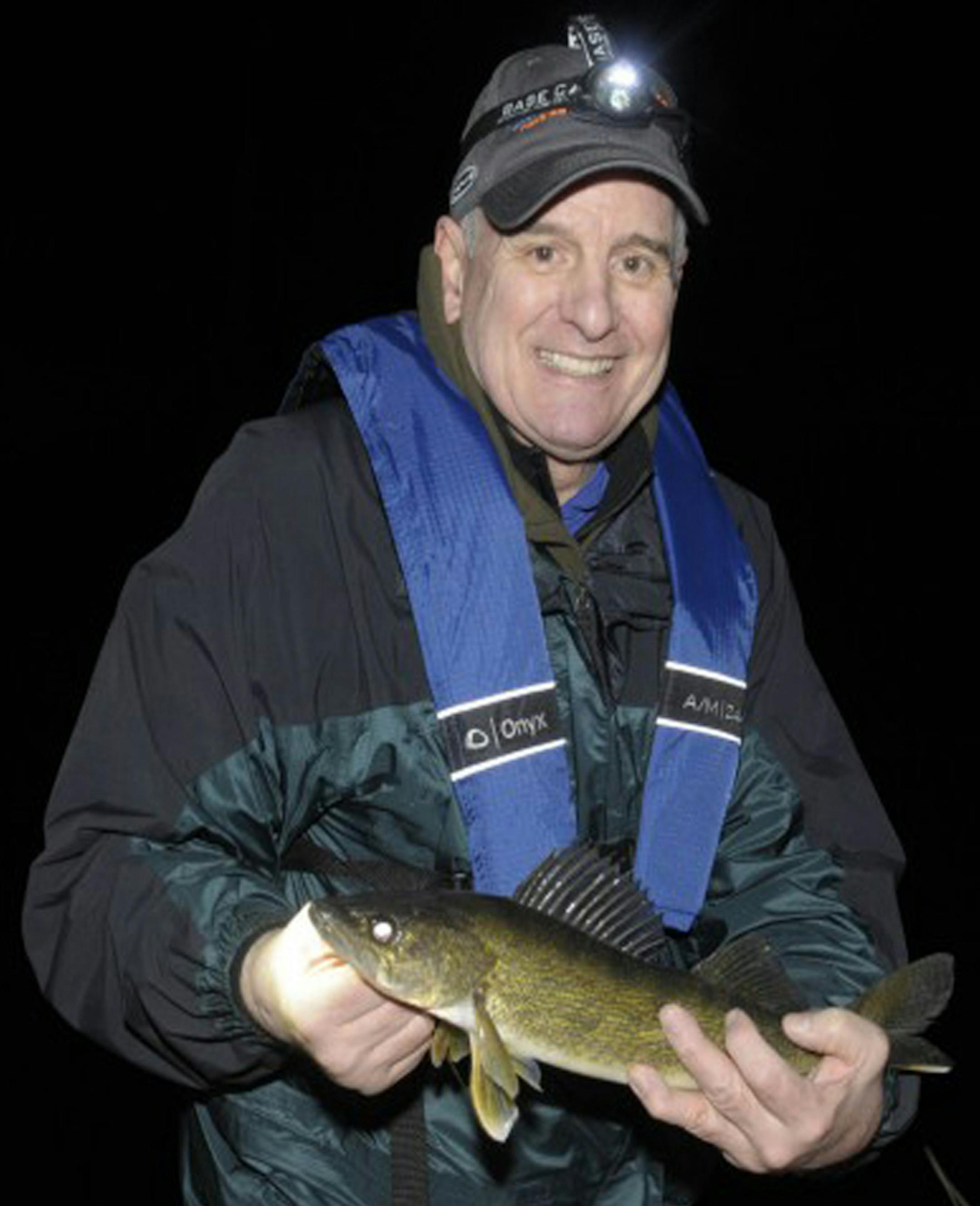 Gov. Mark Dayton with opening day walleye he caught and released in the Park Rapids area.