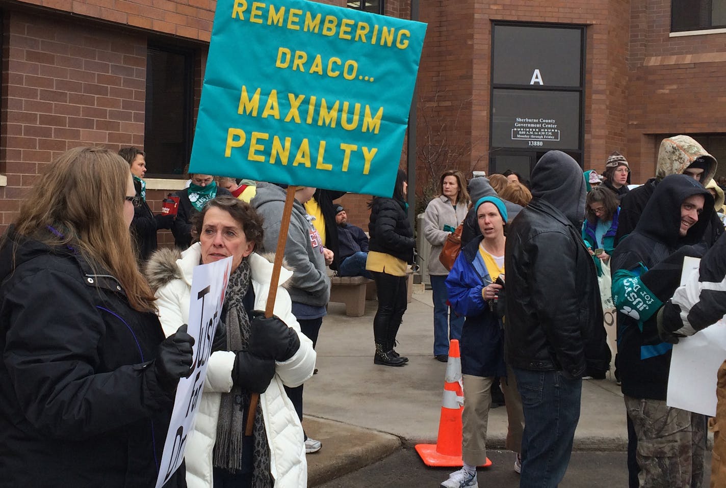 Dozens of protesters rallied outside the Sherburne County Courthouse Wednesday, calling for harsh punishment for Anthony Sather, 25, who videotaped himself smiling as he tortured and killed his girlfriend's dog.