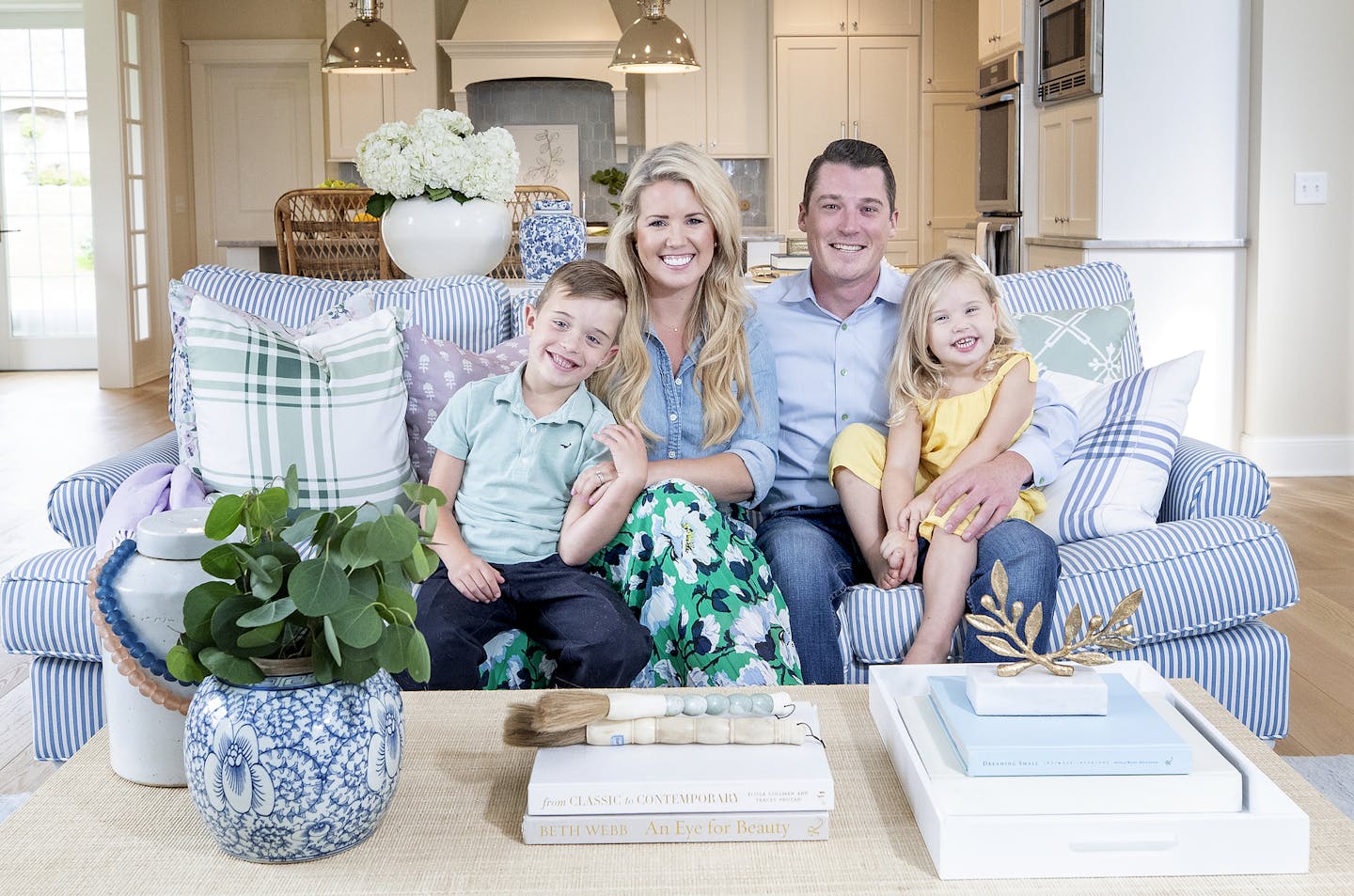 Designer Bria Hammel at home in West St. Paul with her husband, Charlie, and their children Louie, 6, and Brooklyn, 3. Much of the family's furniture and accent pieces are from Hammel's new collection, Brooke & Lou.