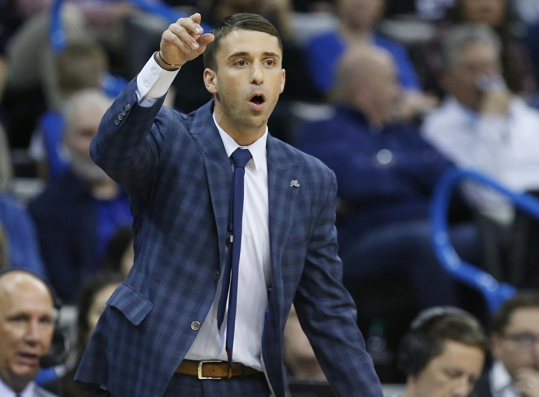 Minnesota Timberwolves interim head coach Ryan Saunders gestures in the first half of an NBA basketball game against the Oklahoma City Thunder in Oklahoma City, Tuesday, Jan. 8, 2019. (AP Photo/Sue Ogrocki)