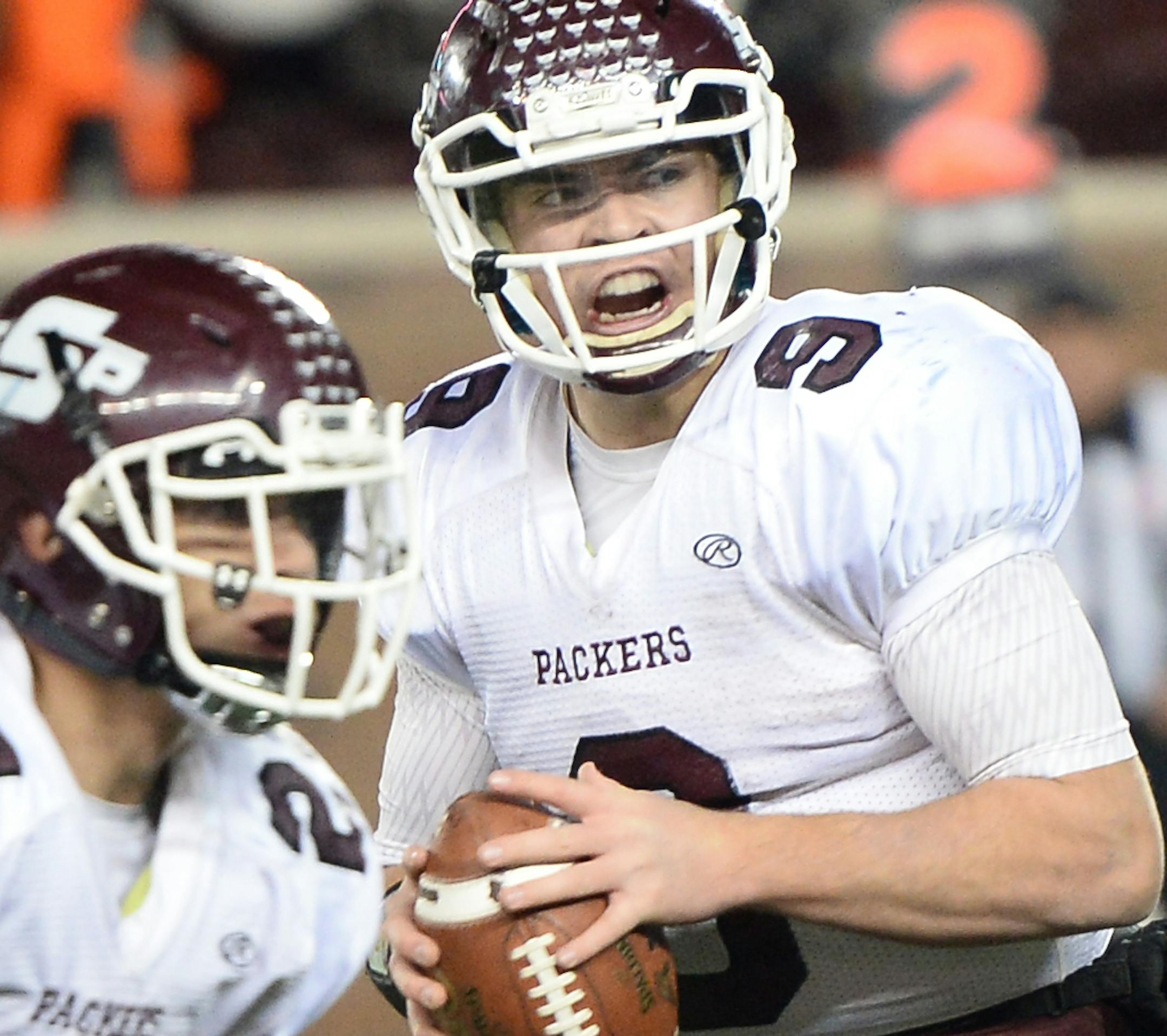 South Saint Paul quarterback Dan Pietruszewski (9) looked to pass the ball down field in the fourth quarter. ] (AARON LAVINSKY/STAR TRIBUNE) aaron.lavinsky@startribune.com Becker played South St. Paul in the Class 4A championship game on Friday, Nov. 13, 2015 at TCF Bank Stadium.