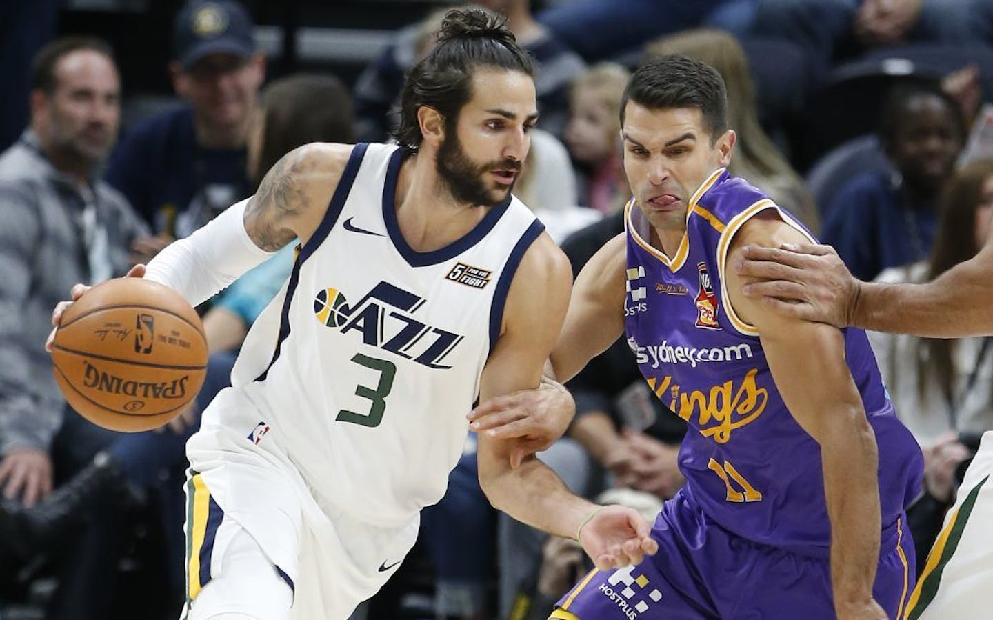 Utah Jazz guard Ricky Rubio (3) drives around Sydney Kings guard Kevin Lisch (11) during the first half of a preseason NBA basketball game Monday, Oct. 2, 2017, in Salt Lake City.