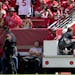 San Francisco 49ers quarterback Trey Lance gestures while being carted off the field Sunday. He is out for the season.