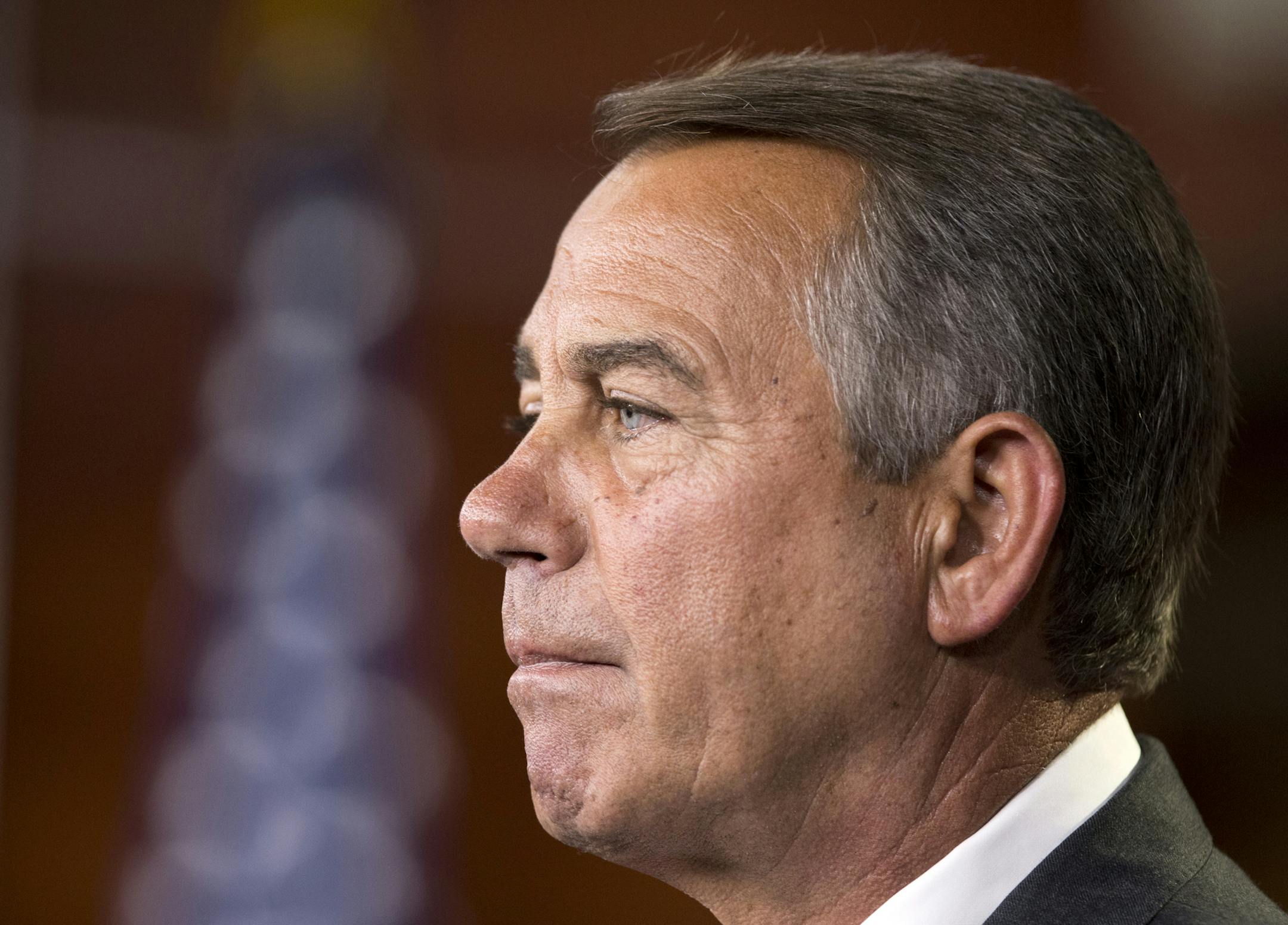 House Speaker John Boehner of Ohio, pauses as he speaks to reporters on Capitol Hill in Washington, Thursday, July 10, 2014, during a news conference. (AP Photo/Manuel Balce Ceneta)