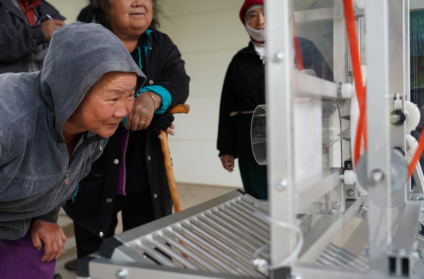 Chao Tao Moua looked over the brussels sprout harvester that mechanical engineering students at the University of St. Thomas created that picks buds off two stalks a minute. ] Shari L. Gross &#x2022; shari.gross@startribune.com The Hmong American Farmers Association (HAFA) partnered with students at the University of St. Thomas to create a machine that could help small-scale farmers harvest Brussels sprouts, one of the most popular crops they grow. They will present the prototype Thursday at the