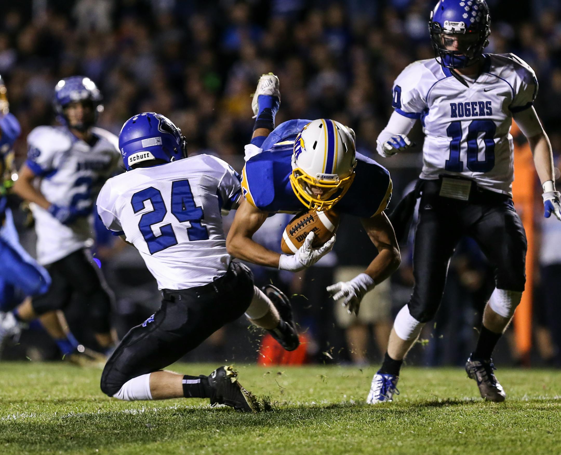 St. Michael-Albertville's Isaiah Weston caught a pass for a first down against Rogers last season.