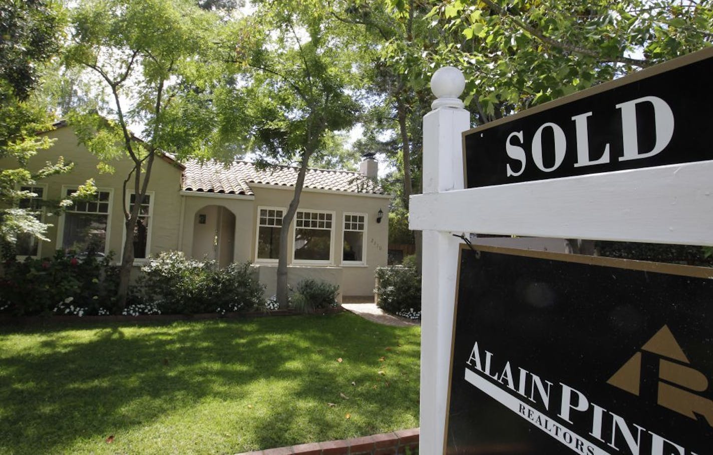 This Tuesday, Aug. 21, 2012, photo, shows an exterior view of a home sold in Palo Alto, Calif. A measure of U.S. home prices jumped 4.6 percent in August compared with a year ago, the largest year-over-year increase in more than six years. CoreLogic, a private real estate data provider, also said Tuesday that prices rose 0.3 percent in August from July, the sixth straight monthly gain.