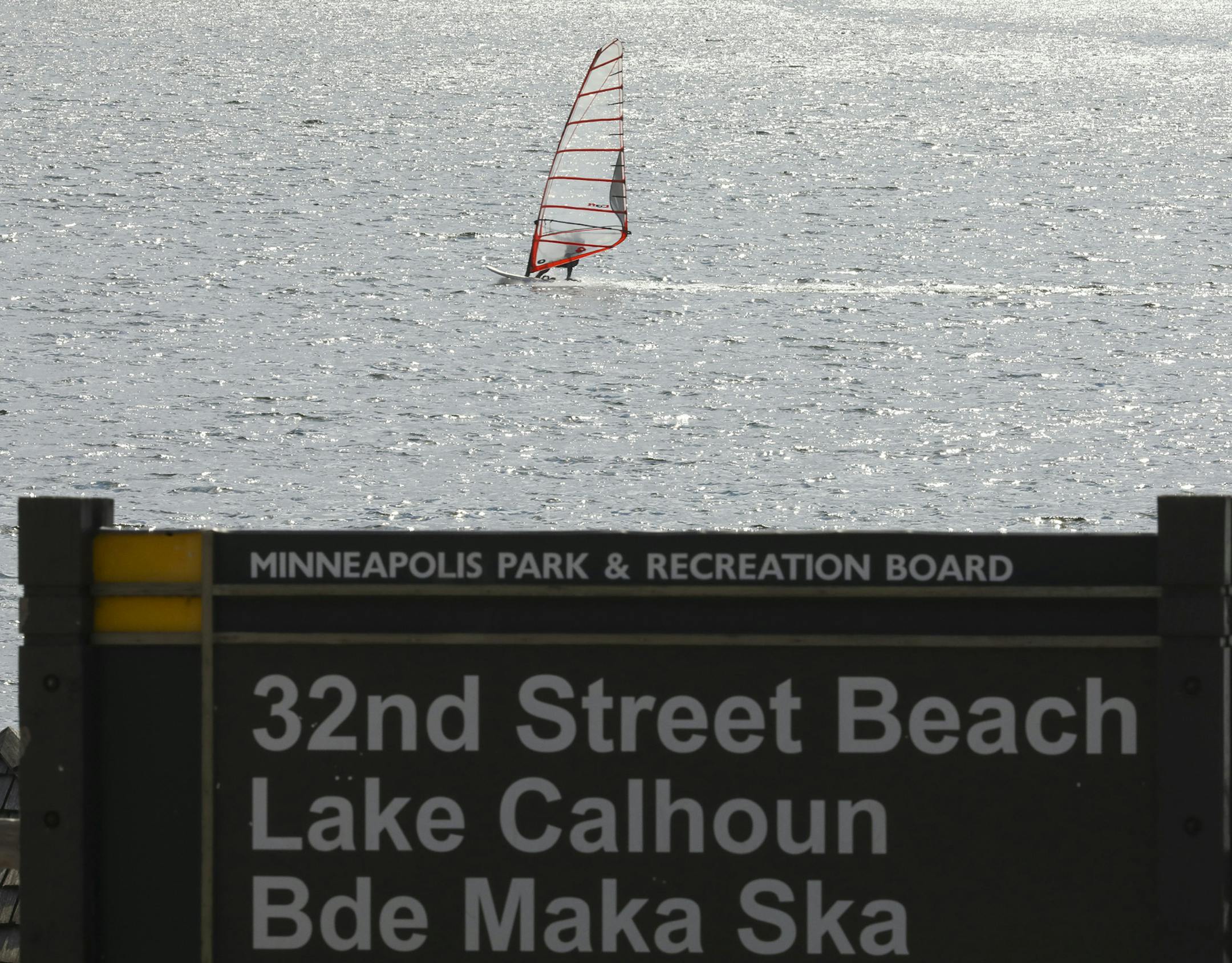 A windsurfer on Lake Calhoun.