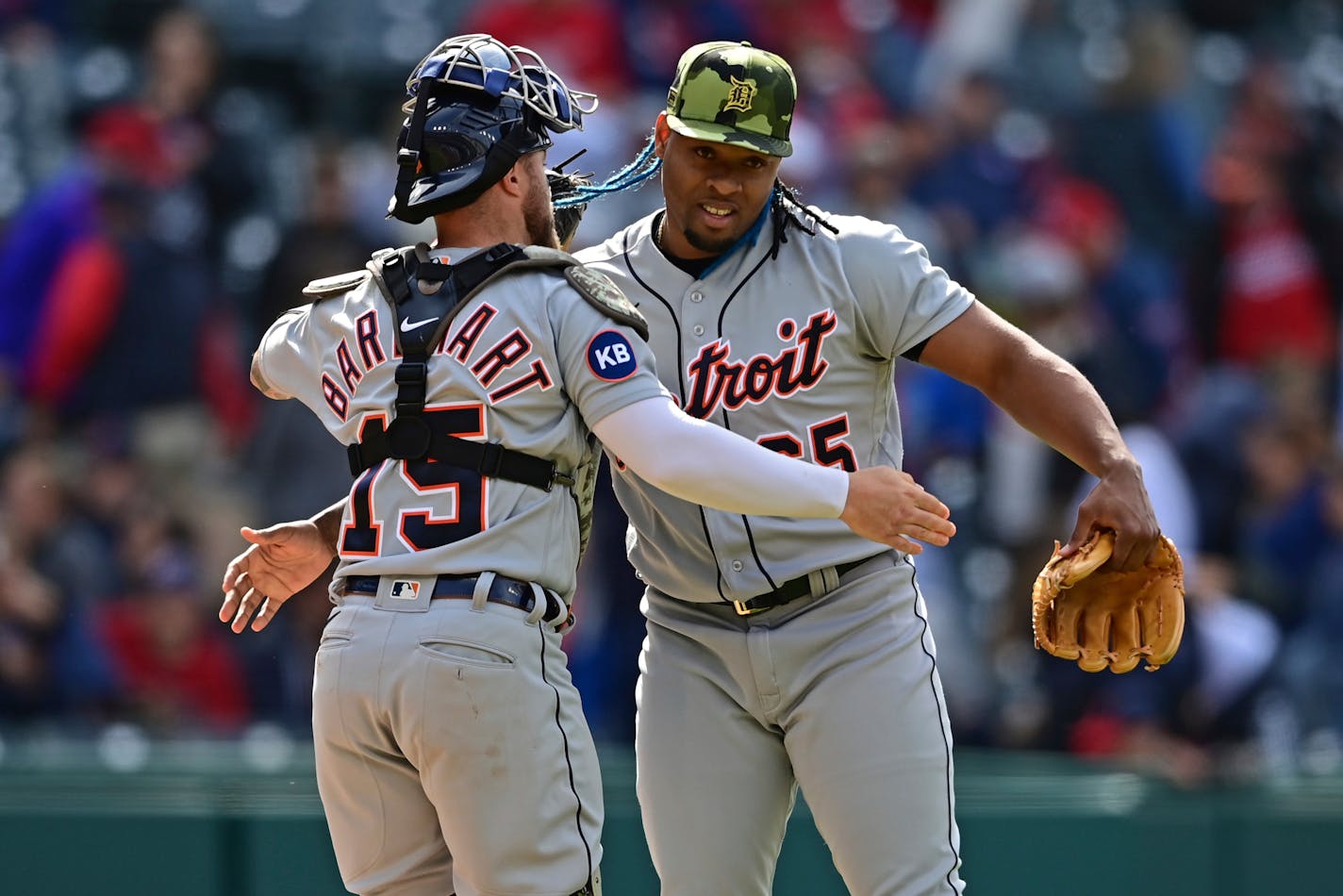 Detroit Tigers relief pitcher Gregory Soto, right, is congratulated by catcher Tucker Barnhart after they defeated the Cleveland Guardians in a baseball game, Sunday, May 22, 2022, in Cleveland. (AP Photo/David Dermer)