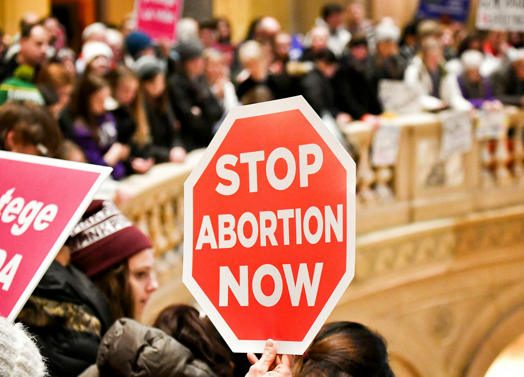Over one thousand people showed up from around Minnesota as Minnesota Citizens Concerned for Life held a March on the State Capitol commemorating the 45th anniversary of the Roe v. Wade decision. The March for Life had to be moved from the Capitol steps to inside and heavy snow moved through the Twin Cities.