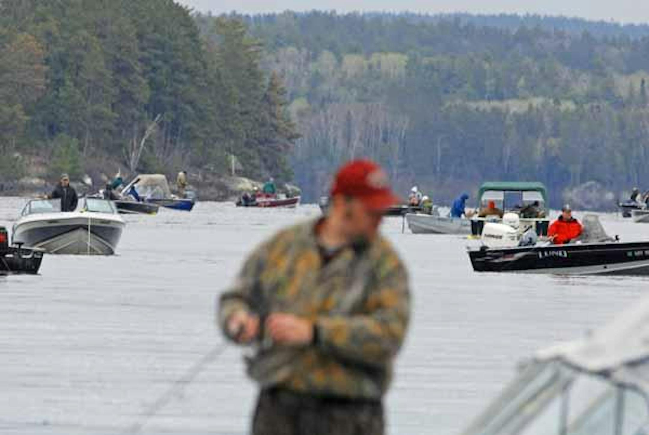 Boats on the opener were crowded near the Gorge on Crane Lake, with many anglers ''rigging'' for walleyes.
