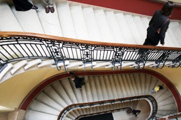 Visitors roamed the stairways at the State Capitol in St. Paul. The Minnesota Legislature is supposed to adjourn on May 18, but negotiations over Hous