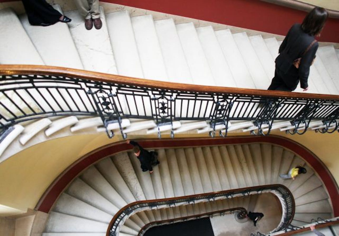 Visitors roamed the stairways at the State Capitol in St. Paul. The Minnesota Legislature is supposed to adjourn on May 18, but negotiations over House and Senate versions and Gov. Tim Pawlenty's views on what shape the tax bill should take could put pressure on that deadline.