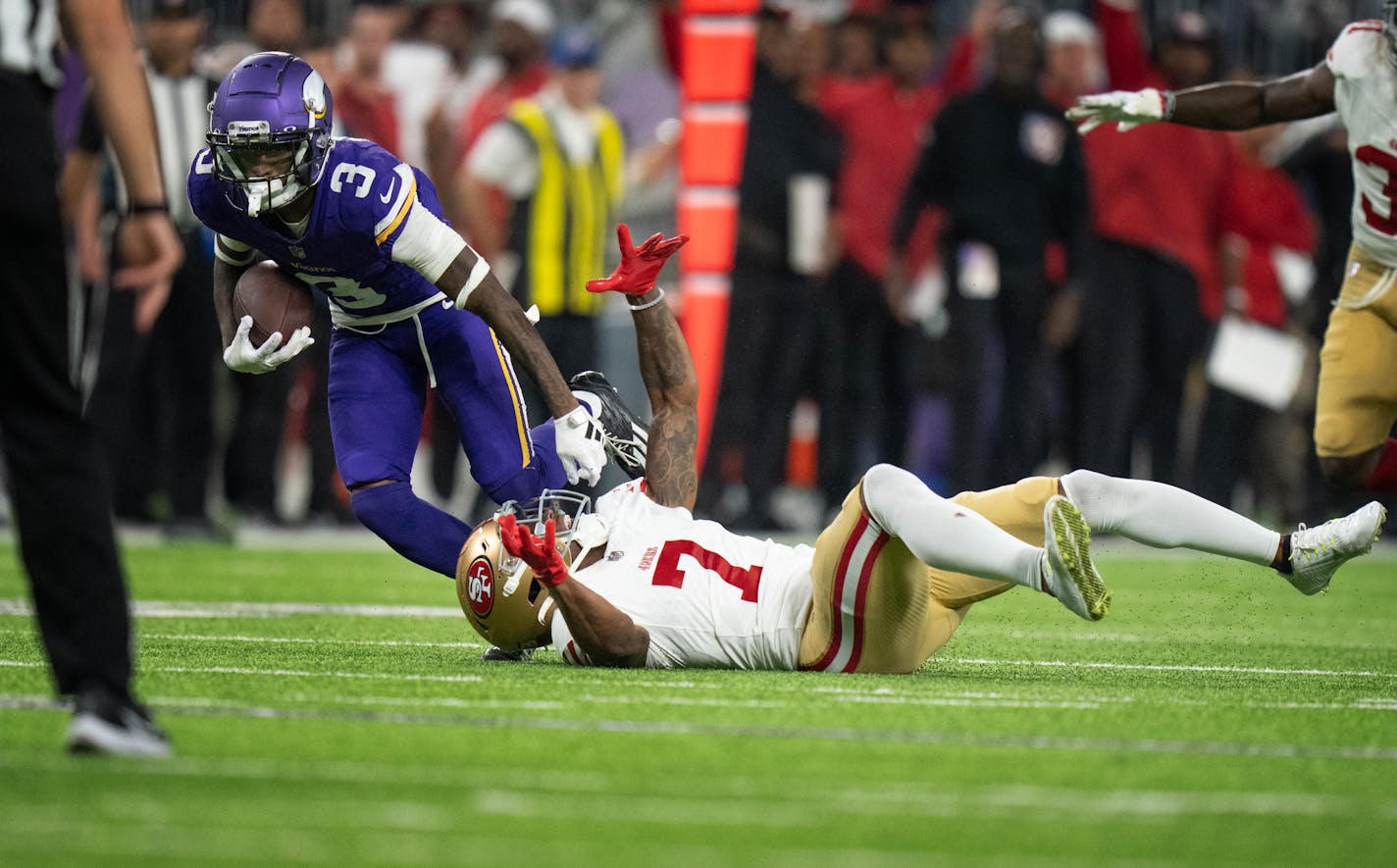 Minnesota Vikings wide receiver Jordan Addison (3) broke the tackle of San Francisco 49ers cornerback Charvarius Ward (7) for a 60 yard touchdown late in the second quarter Monday October 23,2023 in Minneapolis Minn. ] JERRY HOLT • jerry.holt@startribune.com