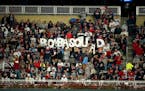 Fans held up a BombaSquad sign in the first inning of Game 3 of the Twins' American League Division Series vs. the Yankees in October. Baseball has no