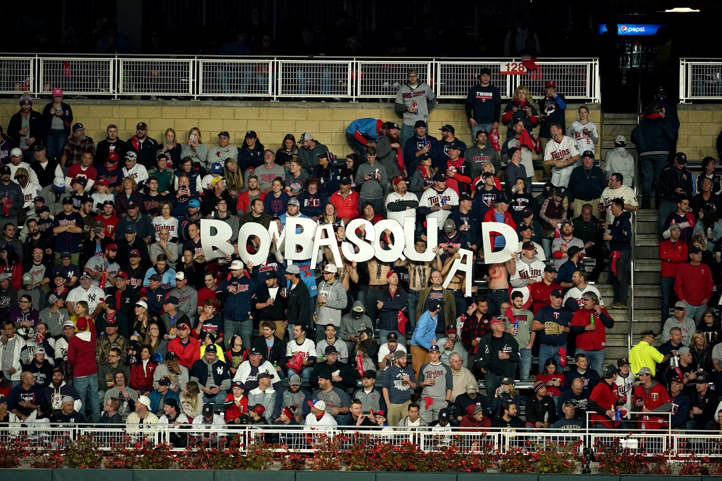 Fans held up a BombaSquad sign in the first inning of Game 3 of the Twins' American League Division Series vs. the Yankees in October. Baseball has not been back in Minnesota since.