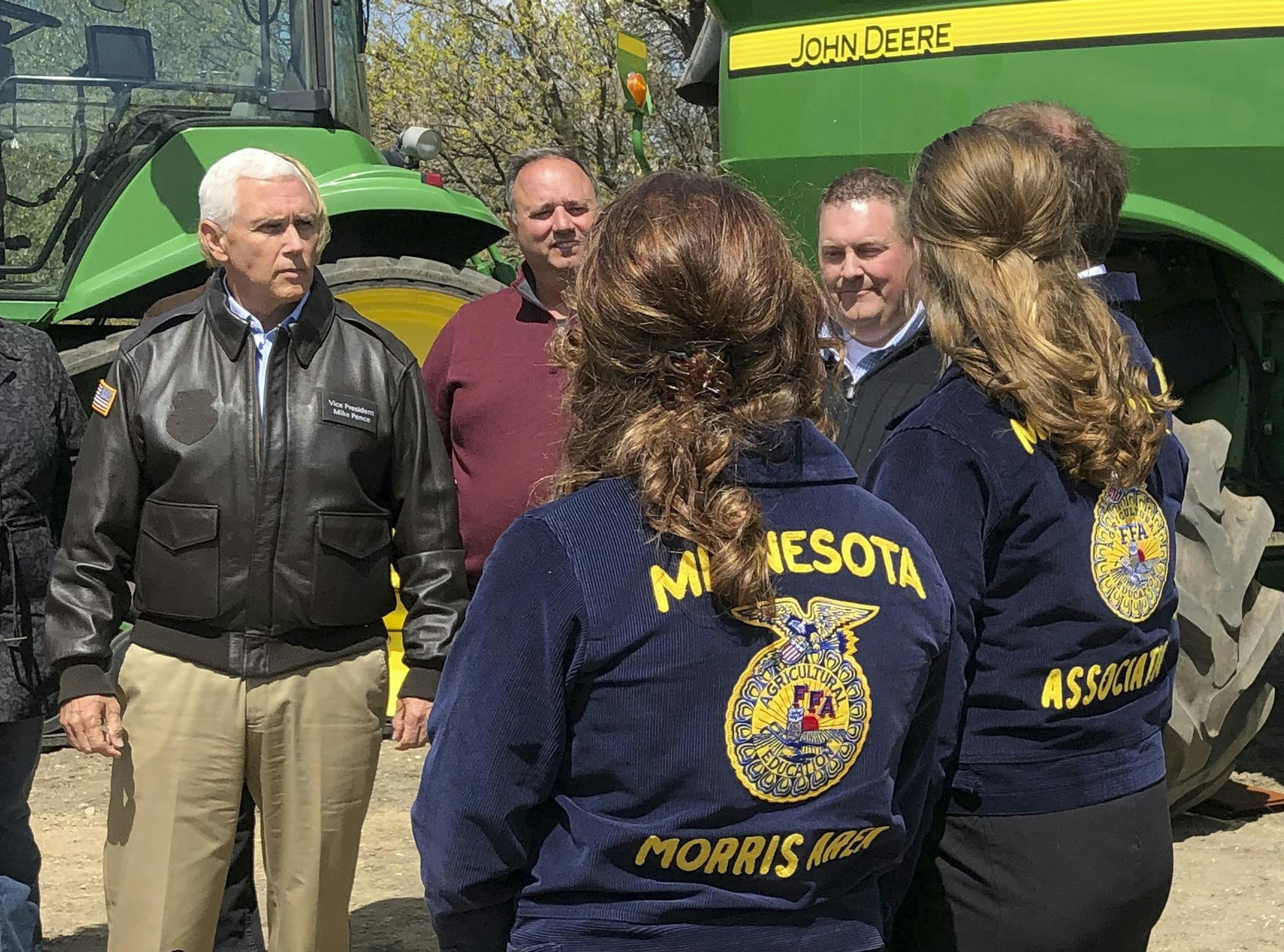 Minnesota farmers and businesses shuddered at the prospect of new trade barriers with Mexico proposed by President Doland Trump. File photo of Vice President Mike Pence, left, with Minnesota farmers and future farmers in Glyndon on May 9, when he toured to promote the new U.S. free trade agreement with Canada and Mexico.
