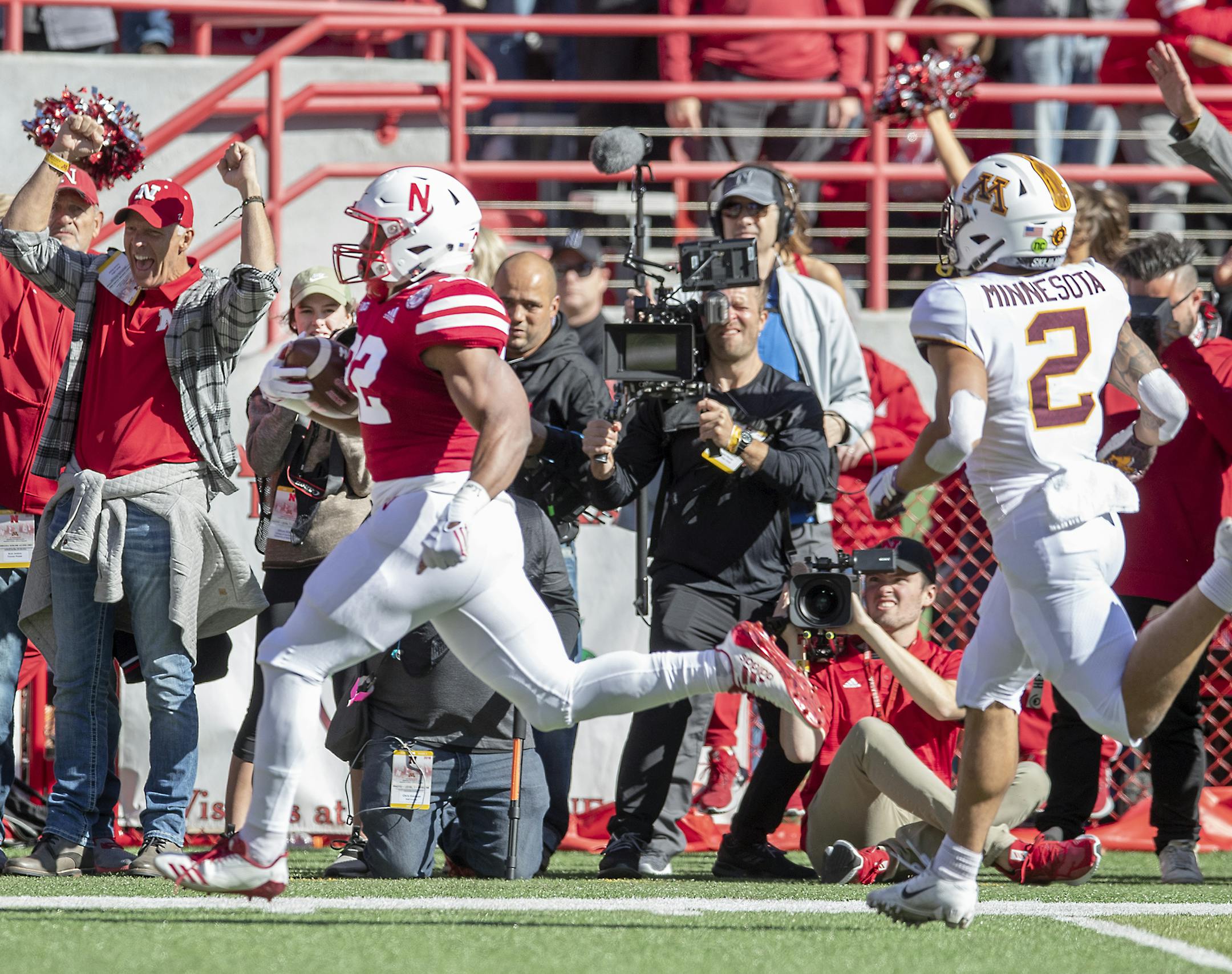 Nebraska's running back Devine Ozigbo broke away from the Minnesota defense including defensive back Jacob Huff during the first quarter as Minnesota took on Nebraska at Memorial Stadium, Saturday, October 20, 2018 in Lincoln, NE. ] ELIZABETH FLORES ï liz.flores@startribune.com