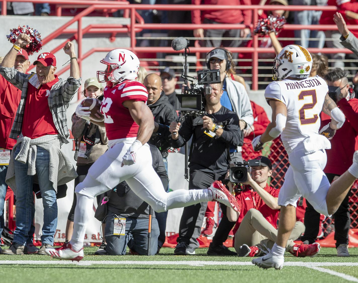 Nebraska's running back Devine Ozigbo broke away from the Minnesota defense including defensive back Jacob Huff during the first quarter as Minnesota took on Nebraska at Memorial Stadium, Saturday, October 20, 2018 in Lincoln, NE. ] ELIZABETH FLORES &#xef; liz.flores@startribune.com