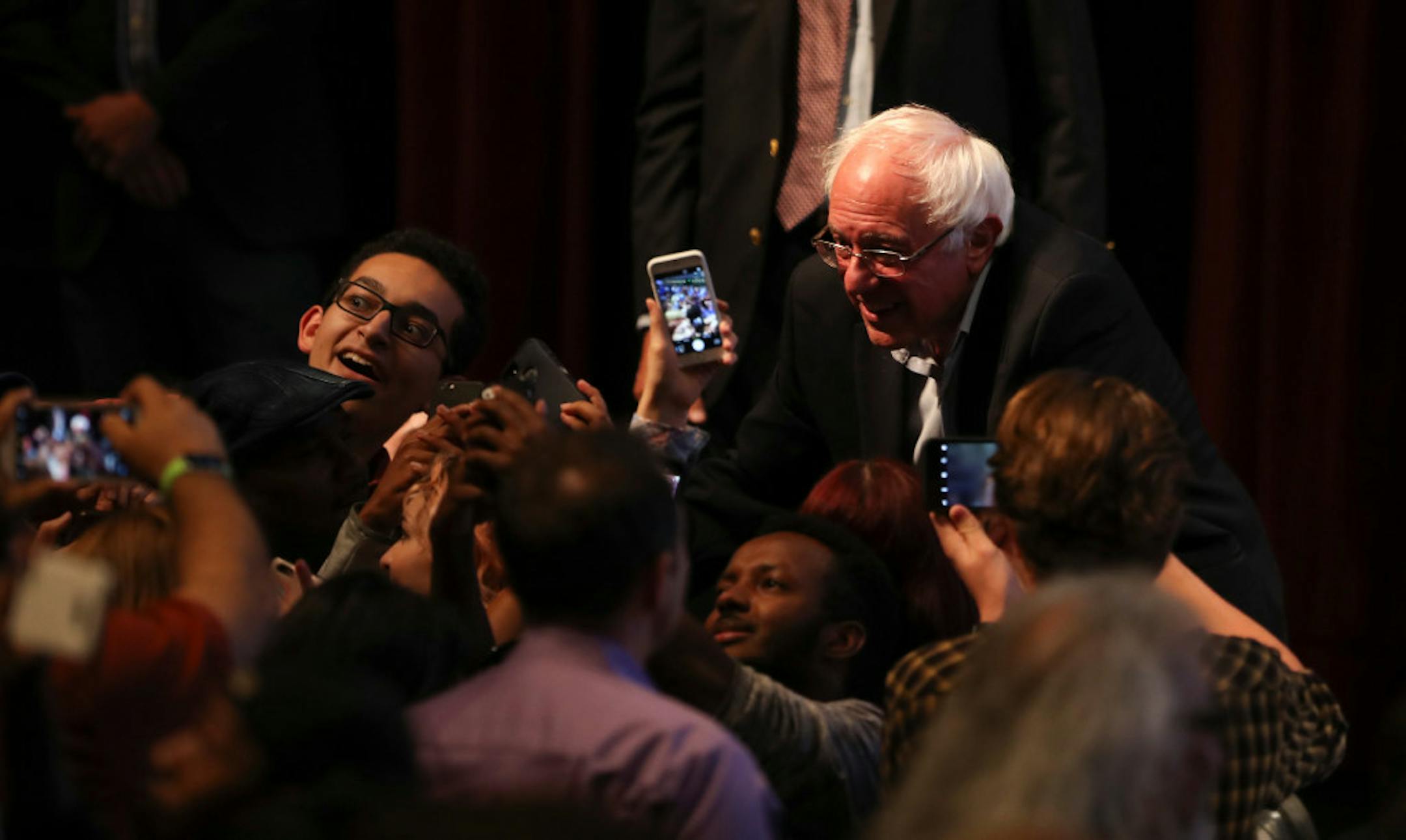 After his speech Tuesday at the University of Minnesota's Northrop Auditorium, Sen. Bernie Sanders posed for selfies with some audience members.