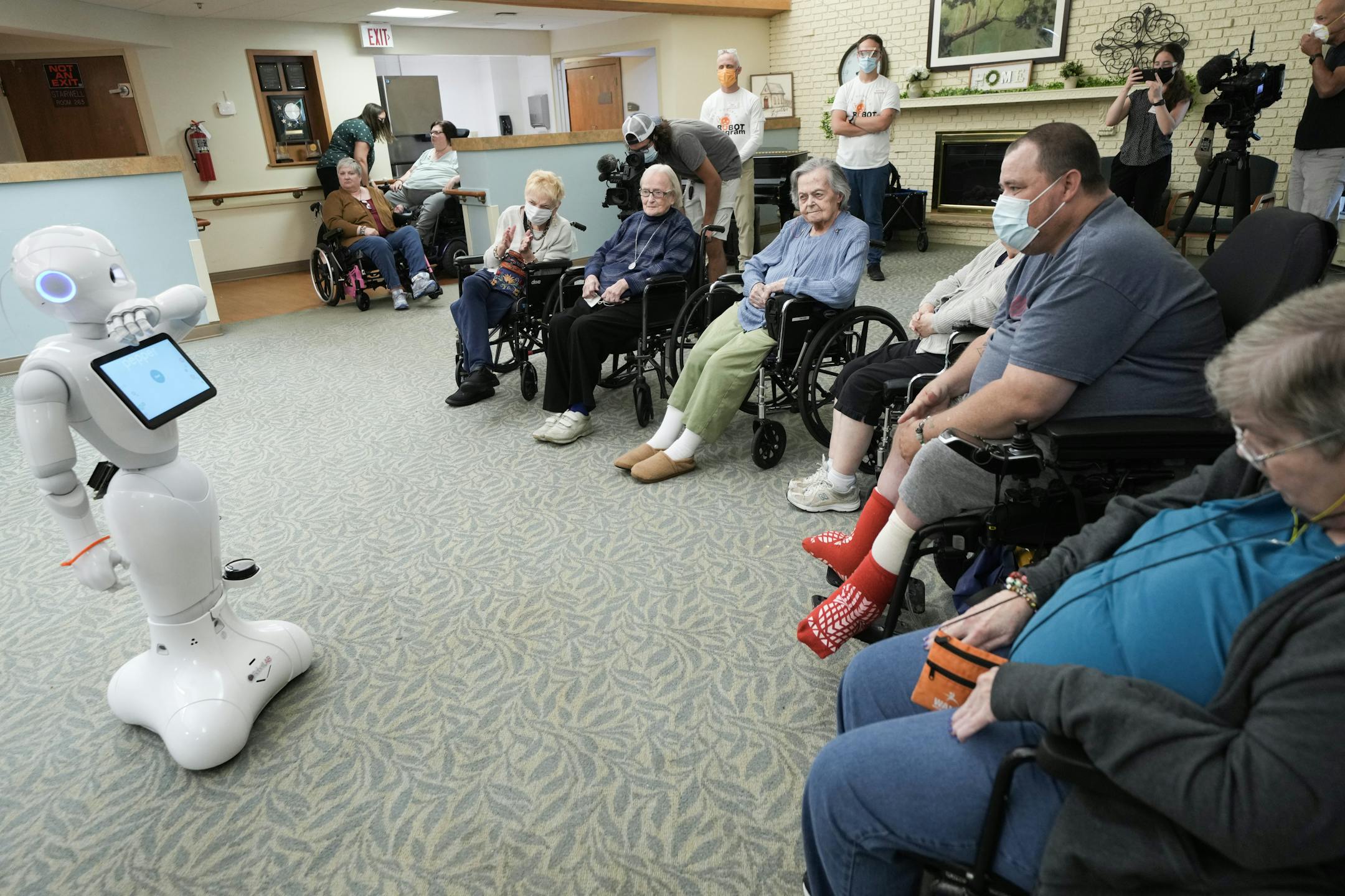 Nursing home residents were introduced to Pepper, a new robotic assistant.