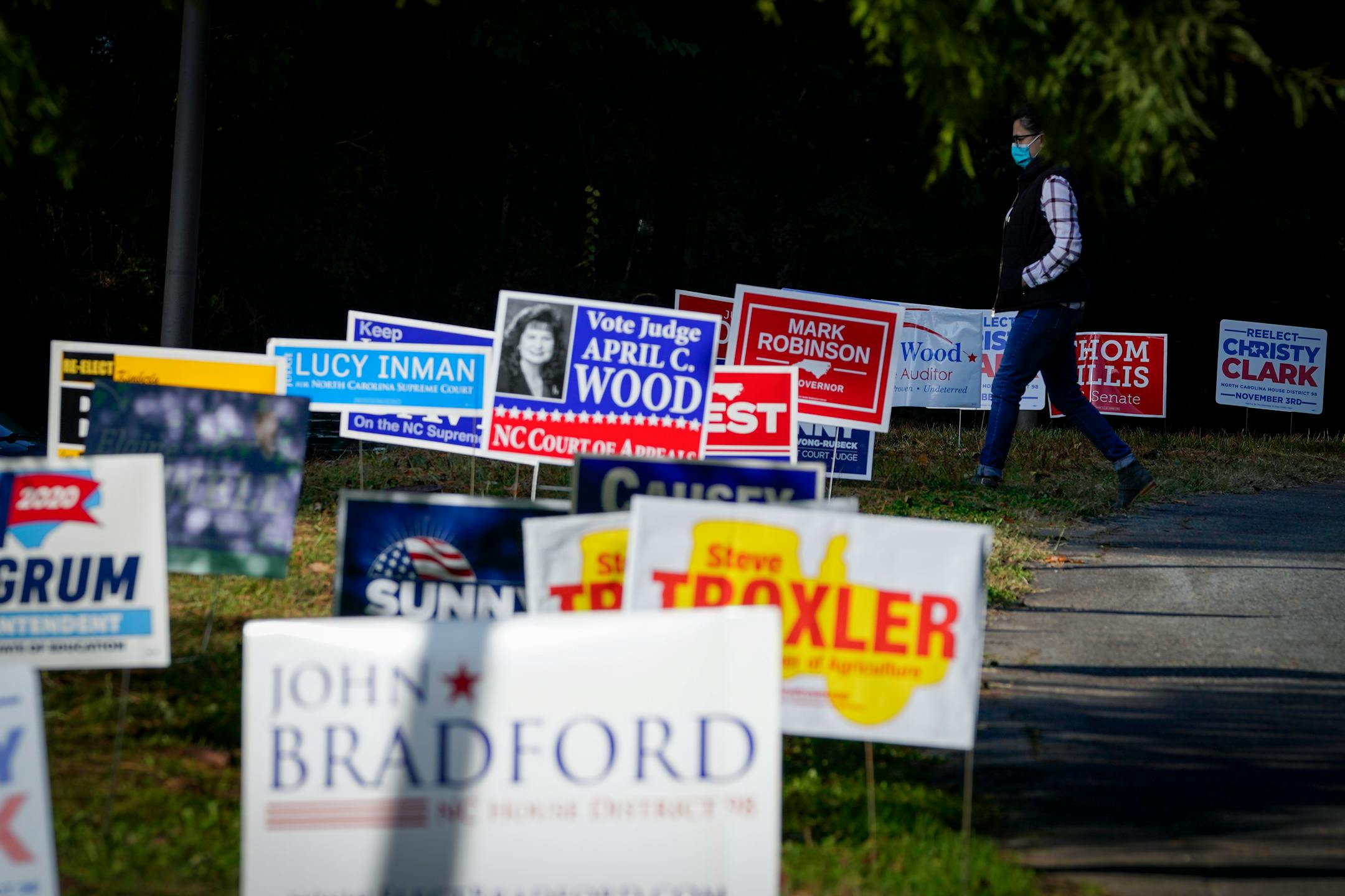 A voter arrives to cast his ballot at a poll location in Jetton Park Tuesday, Nov. 3, 2020, in Cornelius, N.C.