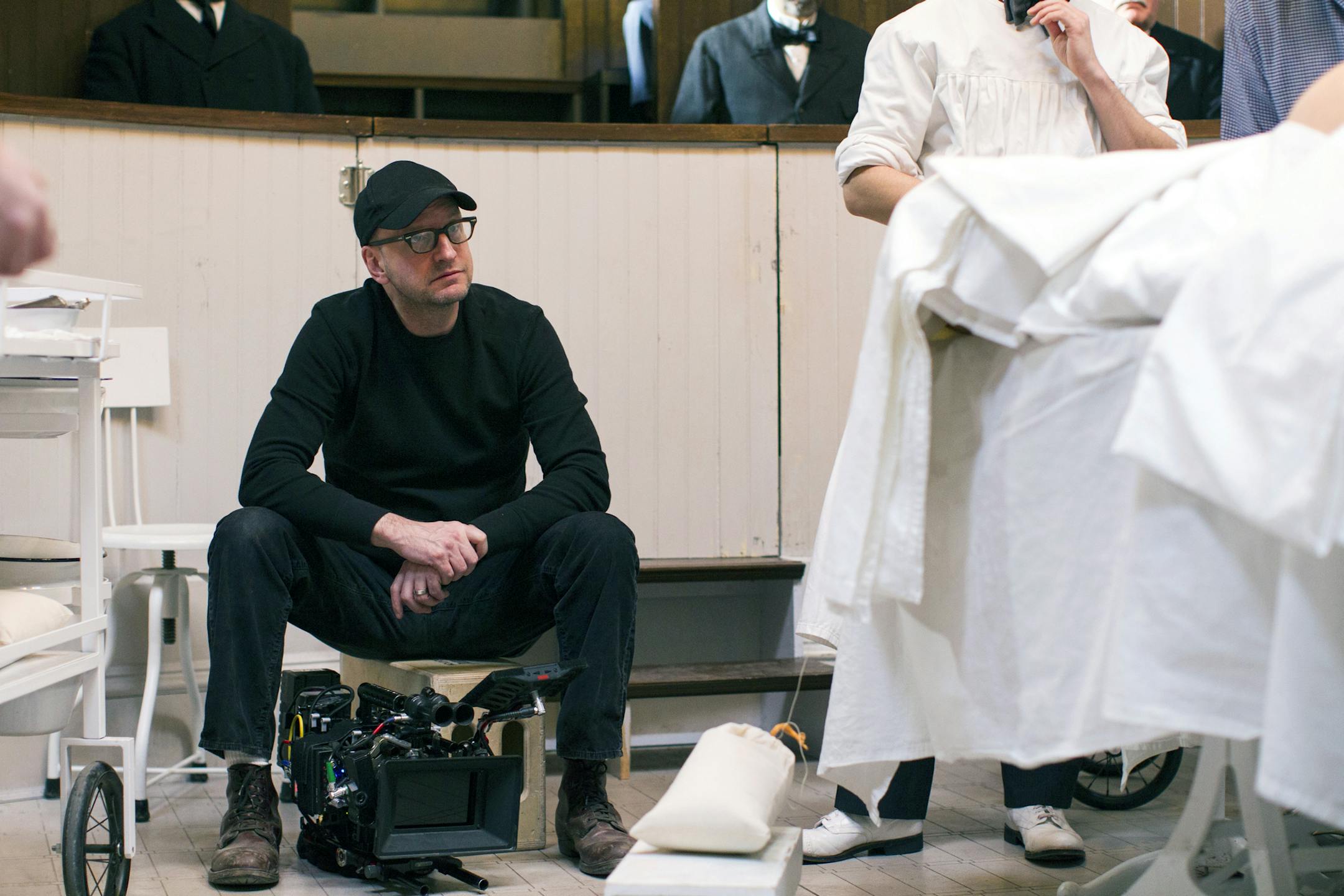 This image released by Cinemax shows director Steven Soderbergh on the set of "The Knick," a 10-episode hospital drama premiering Friday at 10 p.m. EDT on Cinemax. (AP Photo/Cinemax, Mary Cybulski)