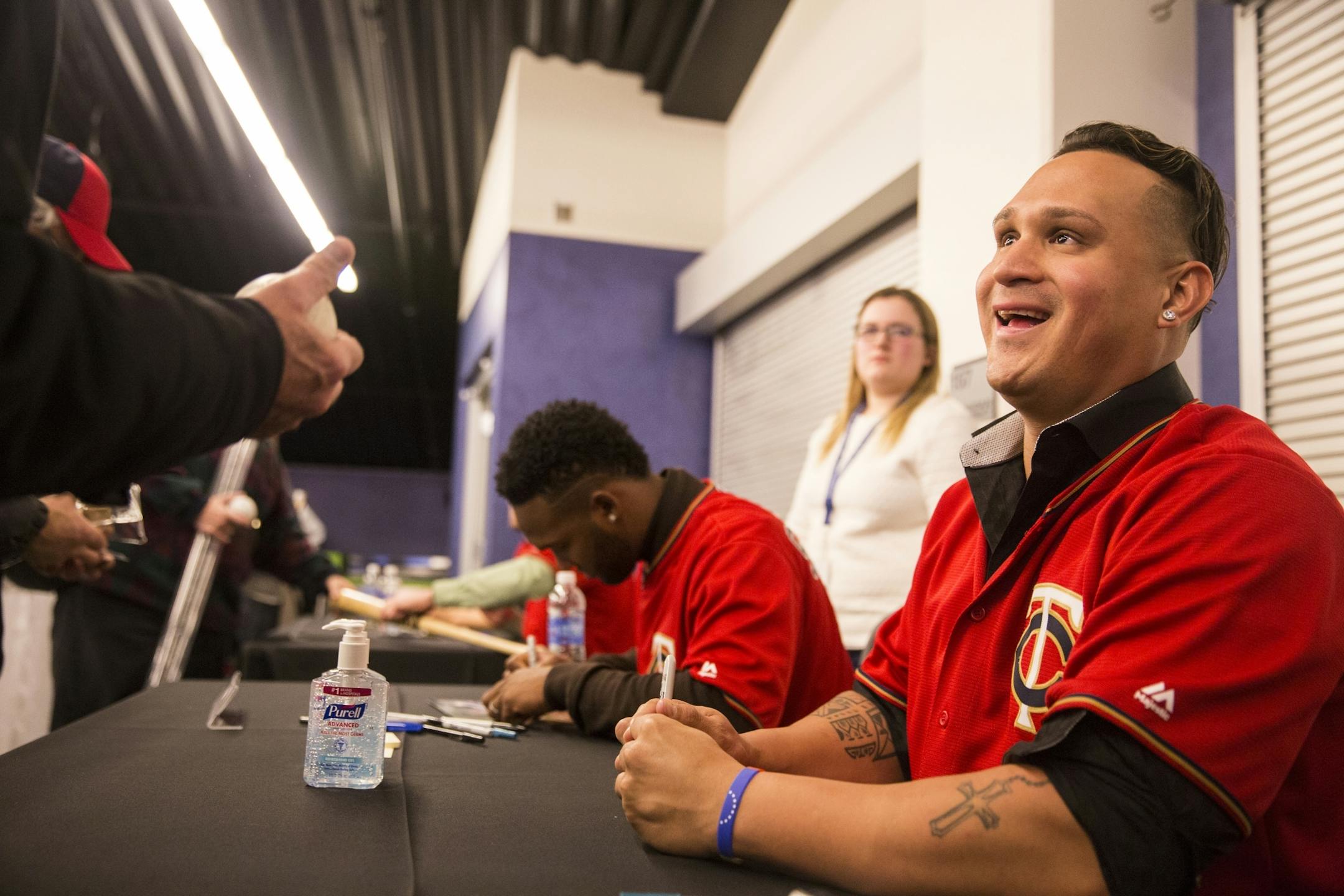 Twins player Oswaldo Arcia talks with a fan during TwinsFest at Target Field in Minneapolis on January 29, 2016.