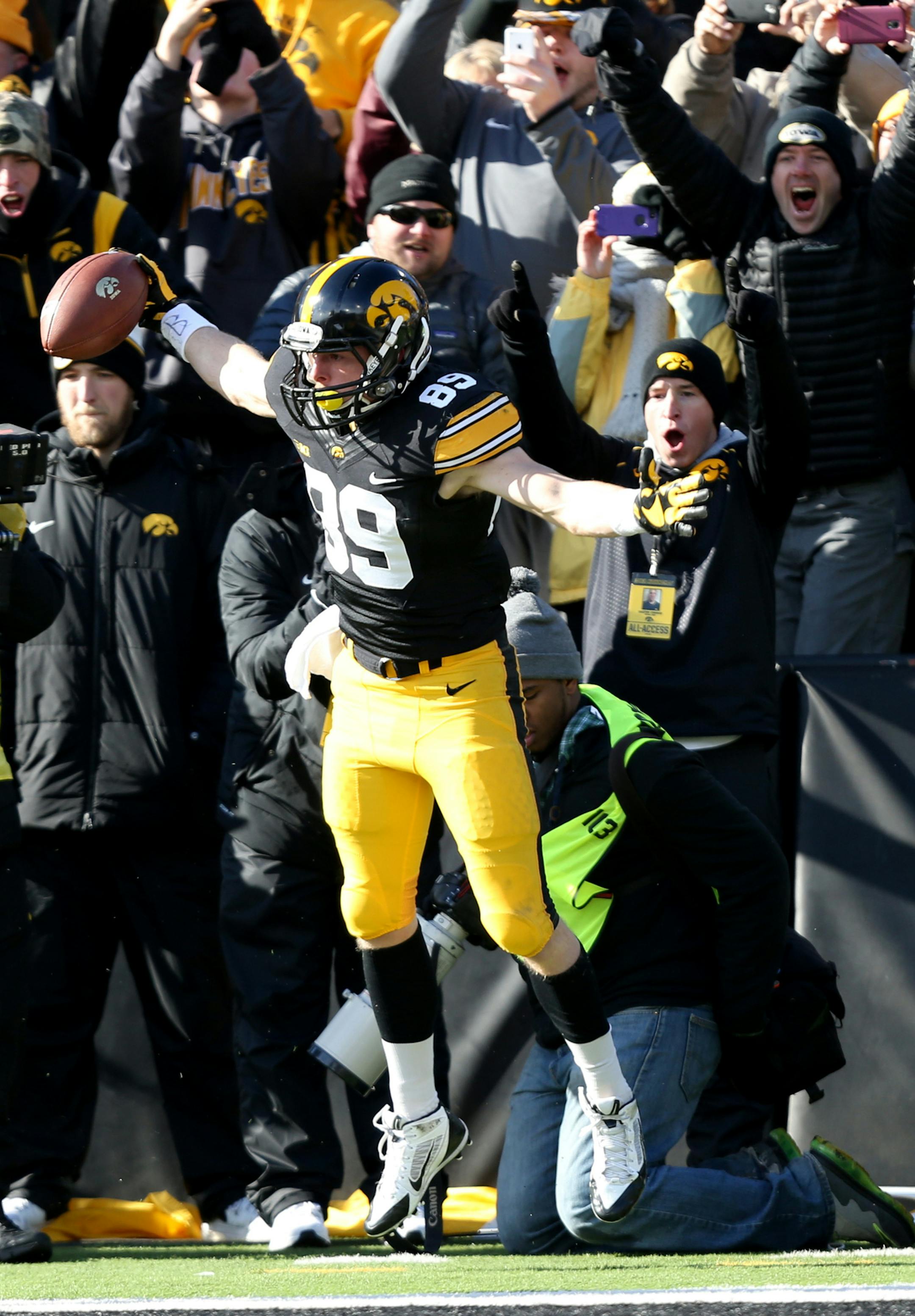 Iowa wide receiver Matt VandeBerg celebrates after scoring a touchdown during the first half of an NCAA college football game against Purdue, Saturday, Nov. 21, 2015, in Iowa City, Iowa. (AP Photo/Justin Hayworth)