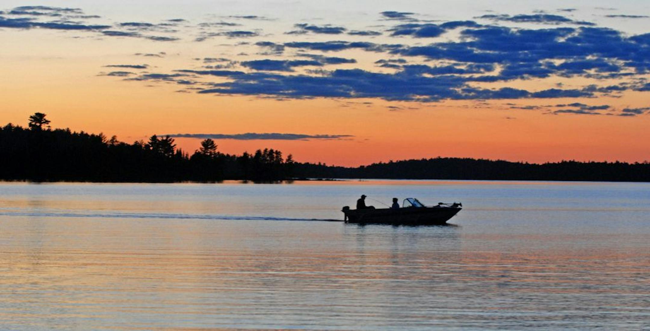 Tranquility and fish abound on Canadian lakes. But to reach them, you have to satisfy Canadian Customs before crossing the border.