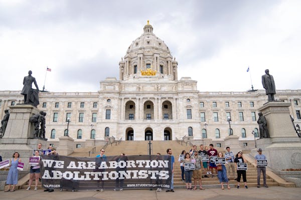 Around 25 people attend a rally outside the Minnesota State Capitol hosted by Students For Life of America to celebrate the Supreme Court overturning 