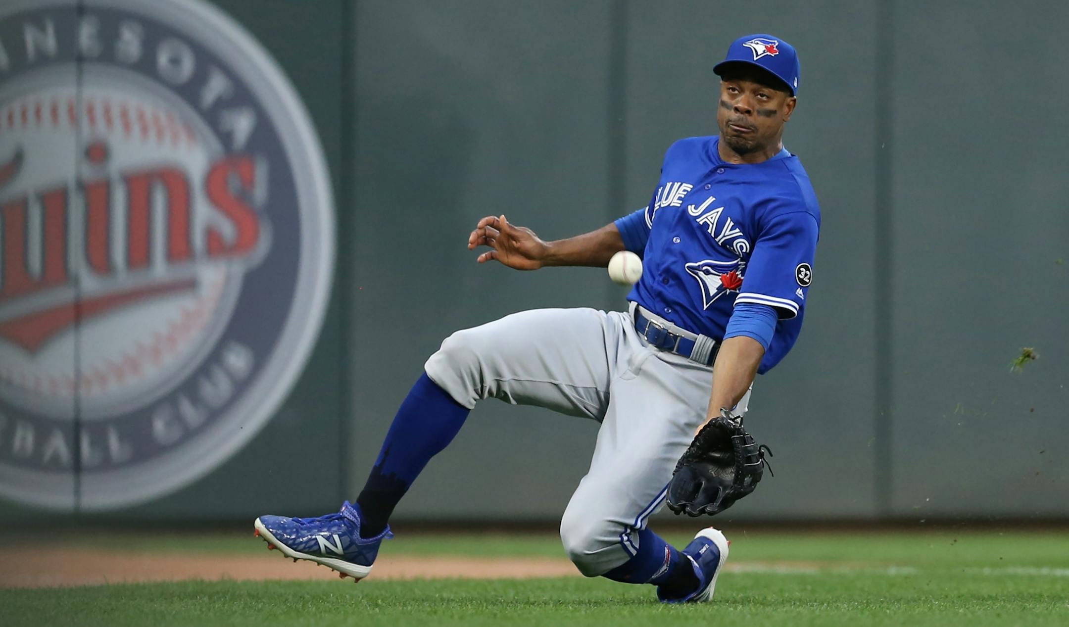 Blue Jays left fielder Curtis Granderson bobbled a ball hit by Eddie Rosario in the first inning at Target Field Tuesday May 1, 2018.