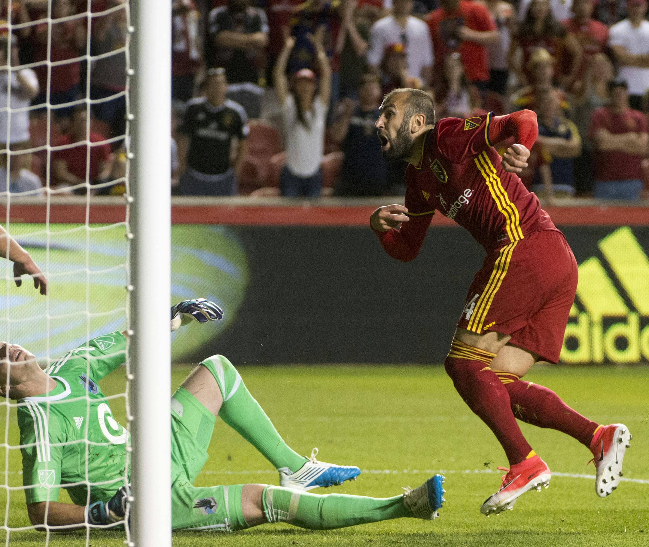 Real Salt Lake forward Yura Movsisyan, right, scores the winning goal against Minnesota United during an MLS soccer match in Sandy, Utah, Saturday, June 17, 2017. (Rick Egan/The Salt Lake Tribune via AP)