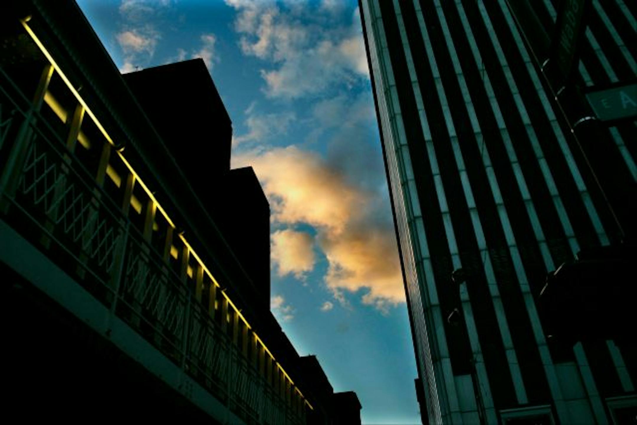 Evening light and artifical light combine to make an interesting picture of a downtown street in Chicago.