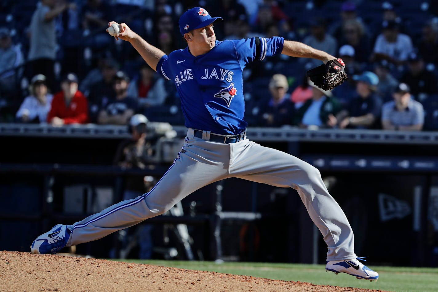 Toronto Blue Jays' Jake Petricka delivers a pitch during the ninth inning of a baseball game against the New York Yankees Saturday, Feb. 22, 2020, in Tampa. (AP Photo/Frank Franklin II)