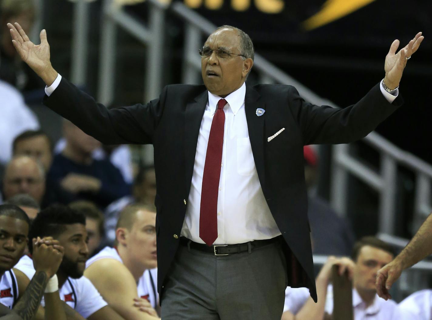 Texas Tech head coach Tubby Smith questions a call during the second half of an NCAA college basketball game against TCU in the first round of the Big 12 conference tournament in Kansas City, Mo., Wednesday, March 9, 2016. TCU defeated Texas Tech 67-62. (AP Photo/Orlin Wagner)