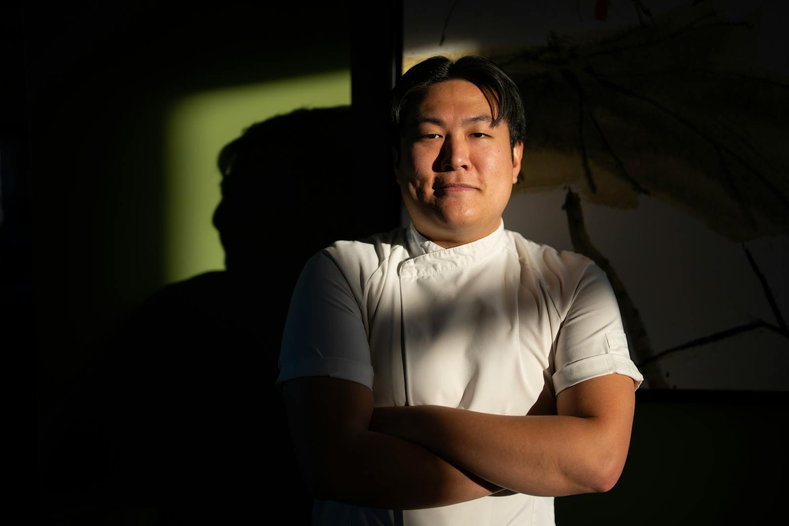 Chef-owner Eric Pham inside his St. Paul restaurant Khue's Kitchen. Pham grew up in restaurants, but is now charting his own course.