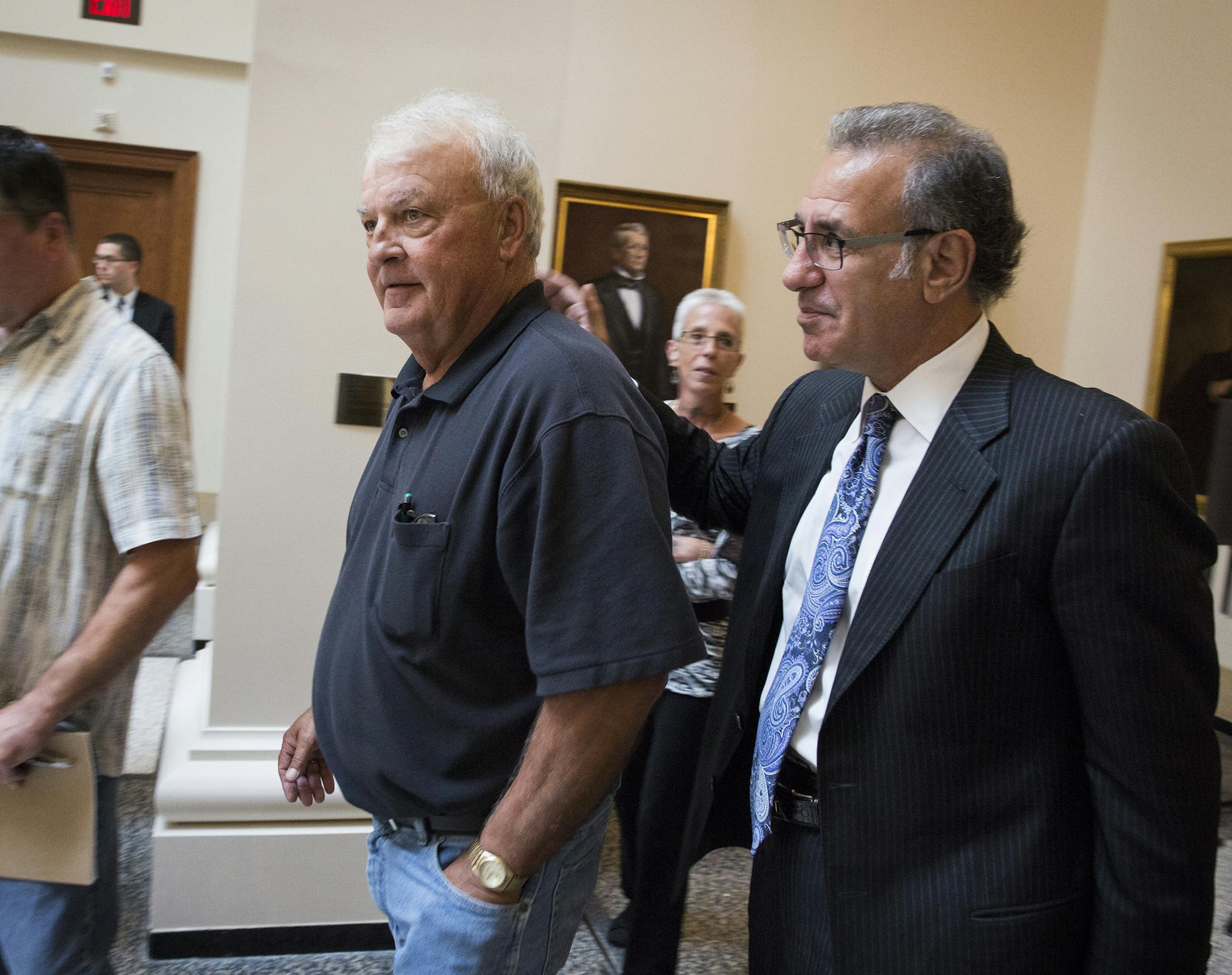 Steven Meshbesher, right, defense attorney for Byron Smith, walks with Bill Anderson, a neighbor and friend of Smith, after an appeal hearing before the Minnesota Supreme Court in St. Paul on Thursday, September 3, 2015. ] LEILA NAVIDI leila.navidi@startribune.com / BACKGROUND INFORMATION: Defense attorneys for Byron Smith, who was convicted of killing two teenage intruders in his Little Falls home, filed an appeal with the Minnesota Supreme Court arguing that Smith&#x2019;s trial was riddled wi