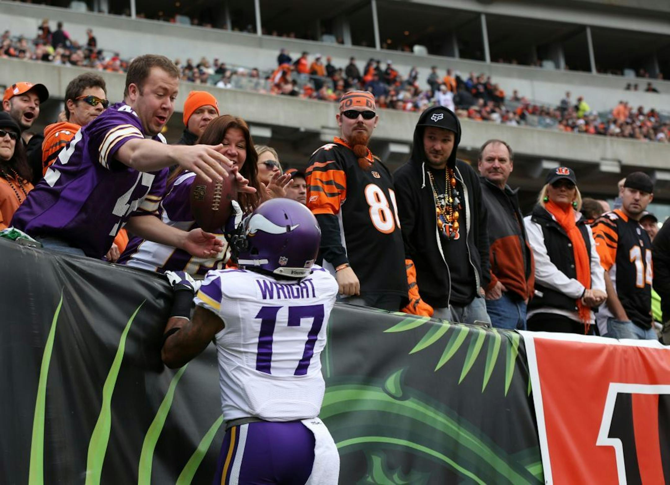 Minnesota Vikings wide receiver Jarius Wright (17) caught a 36-yard touchdown pass from quarterback Matt Cassel, then handed the game ball to Vikings fan Travis Severson in the back of the end zone.