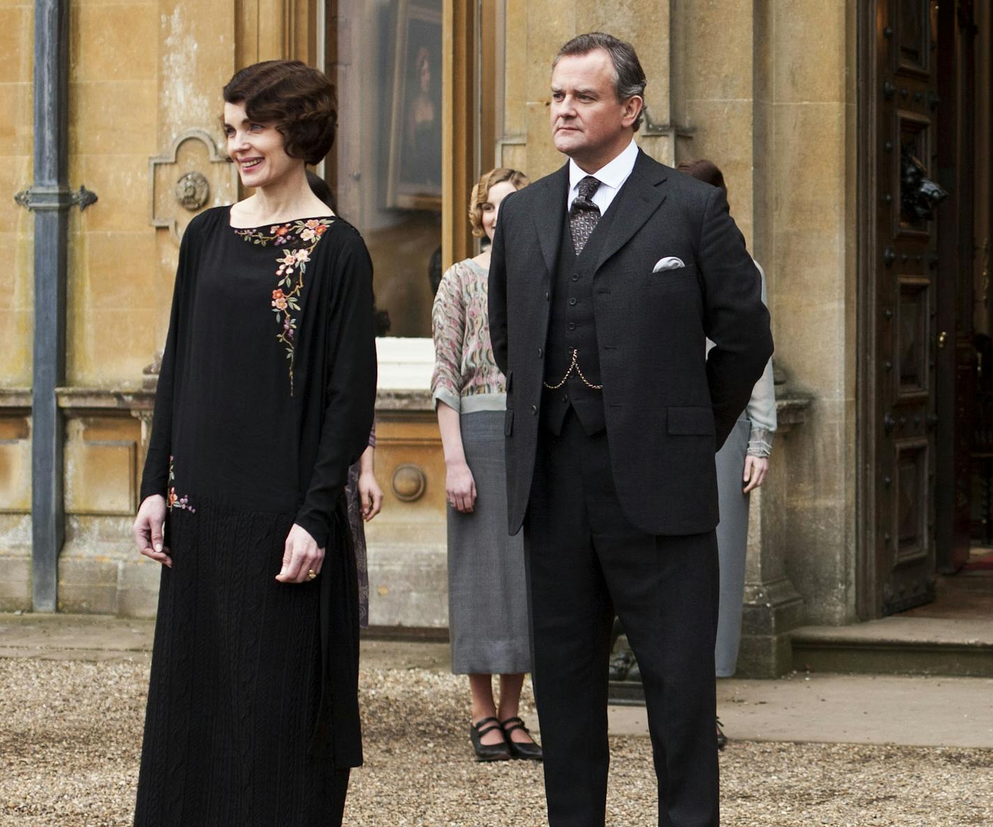 This undated publicity photo provided by PBS shows, from left, Elizabeth McGovern as Lady Grantham, Hugh Bonneville as Lord Grantham, Dan Stevens as Matthew Crawley, Penelope Wilton as Isobel Crawley, Allen Leech as Tom Branson, Jim Carter as Mr. Carson, and Phyllis Logan as Mrs. Hughes, from the TV series, "Downton Abbey." Producers of the popular British period drama on Thursday, March 26, 2015, confirmed it will end after its sixth season, scheduled to air in the U.S. in early 2016. The serie