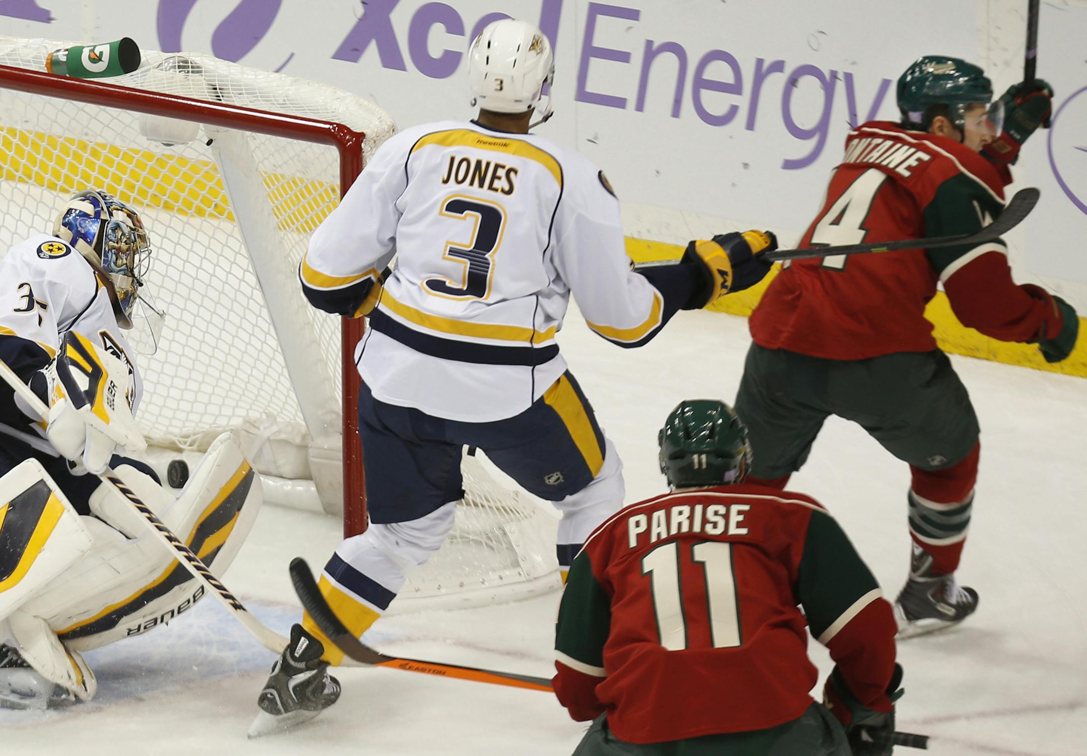 The Wild’s Justin Fontaine skated off after gathering Clayton Stoner’s shot and chipping the rebound past Nashville goalie Pekka Rinne at 18:53 of the second period at Xcel Energy Center on Tuesday night.