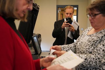 Minnesota Secretary of State Steve Simon watched as election judges performed a public test of St. Louis Park's voting machines Tuesday.