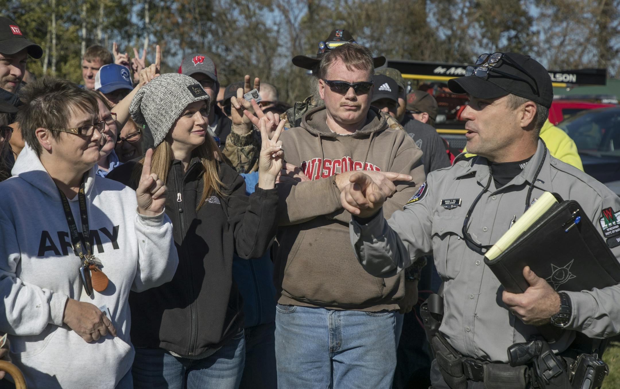 Wisconsin DNR warden supervisor Russell T Fell selected 100 volunteers to searched the ditches along highway 8 in near the home where 13-year-old Jayme Closs lived with her parents James, and Denise Thursday October 18, 2018 in Barron, Wisconsin.