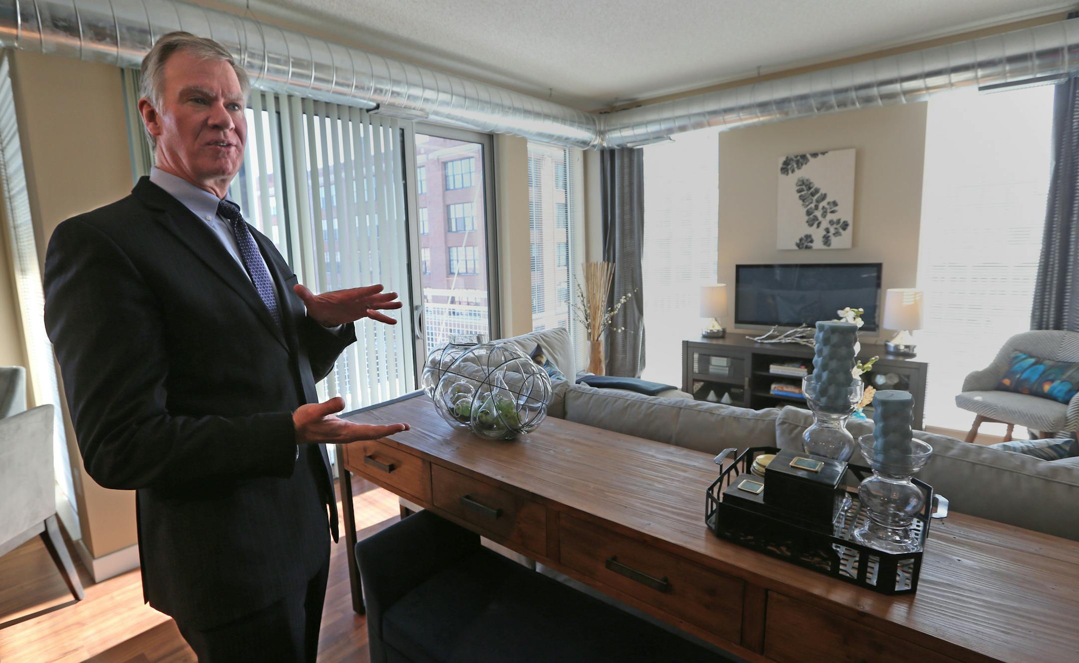 St. Paul Mayor Chris Coleman took a tour of a two-bedroom apartment at the Penfield apartments.