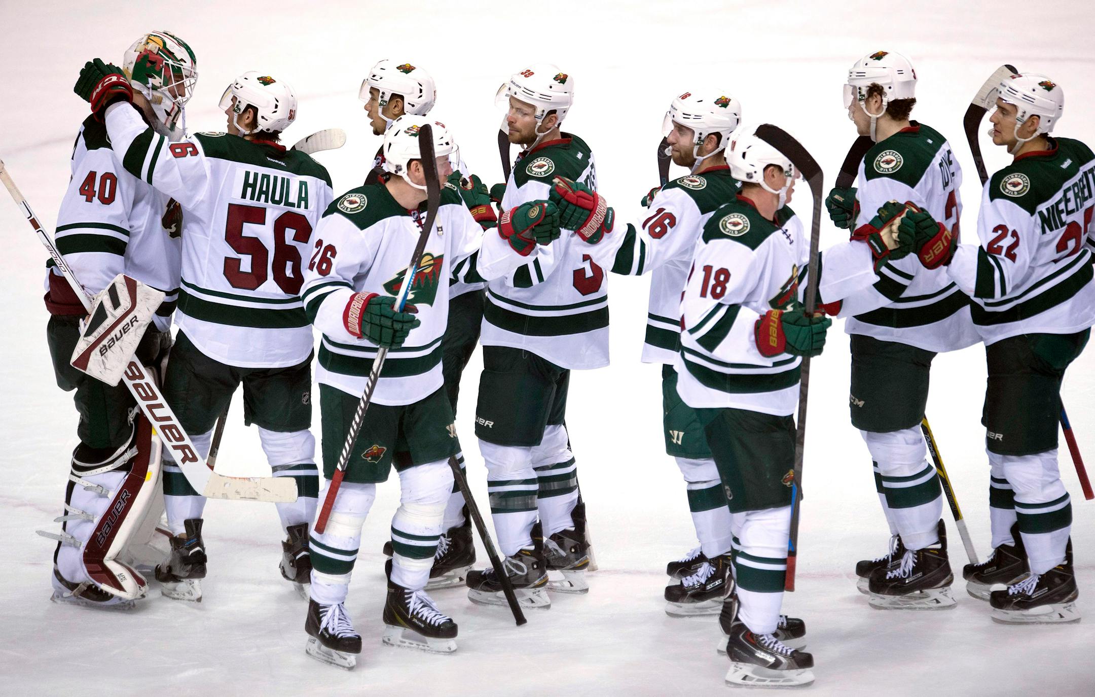 A happy bunch of Wild players celebrated after defeating the Canucks 4-2 in Vancouver on Sunday and completing a 3-0 road trip through western Canada. The Wild returned to Minnesota for a three-game homestand that starts Tuesday against Chicago.
