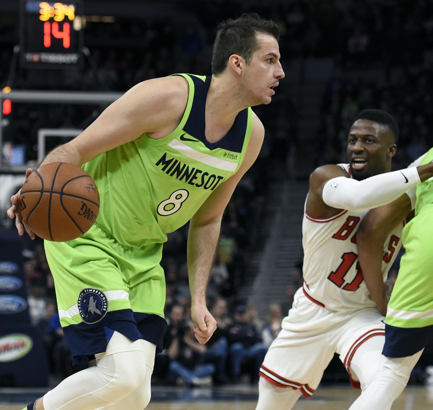 Minnesota Timberwolves' Nemanja Bjelica (8), of Serbia, drives as teammate Taj Gibson (67) sets a pick for Chicago Bulls' David Nwaba (11) during the second quarter of an NBA basketball game on Saturday, Feb. 24, 2018, in Minneapolis. (AP Photo/Hannah Foslien) ORG XMIT: MIN2018031619550943