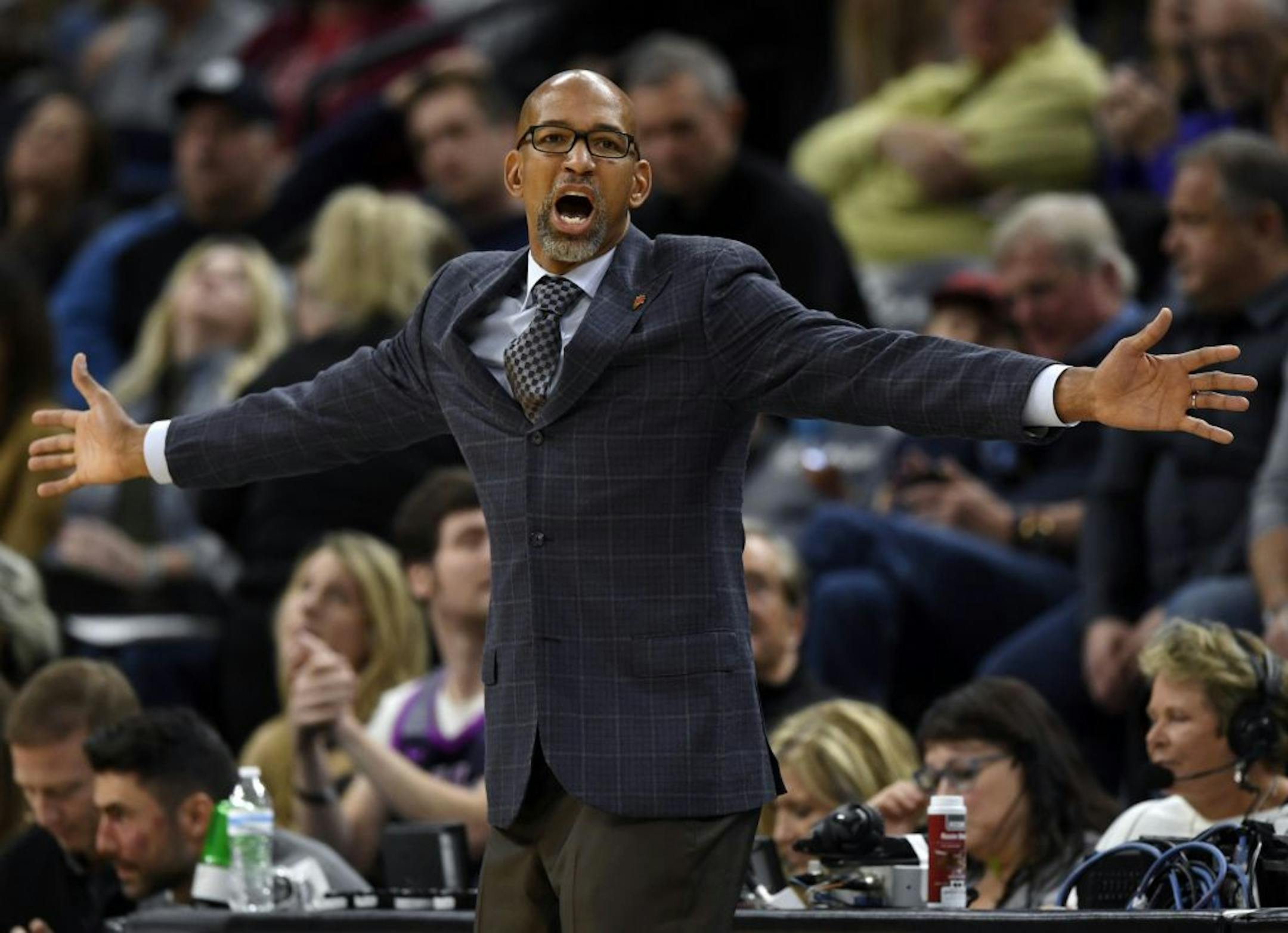 Phoenix Suns coach Monty Williams watches his team play the Minnesota Timberwolves during the third quarter of an NBA basketball game Saturday, Nov. 23, 2019, in Minneapolis. The Suns won 100-98.