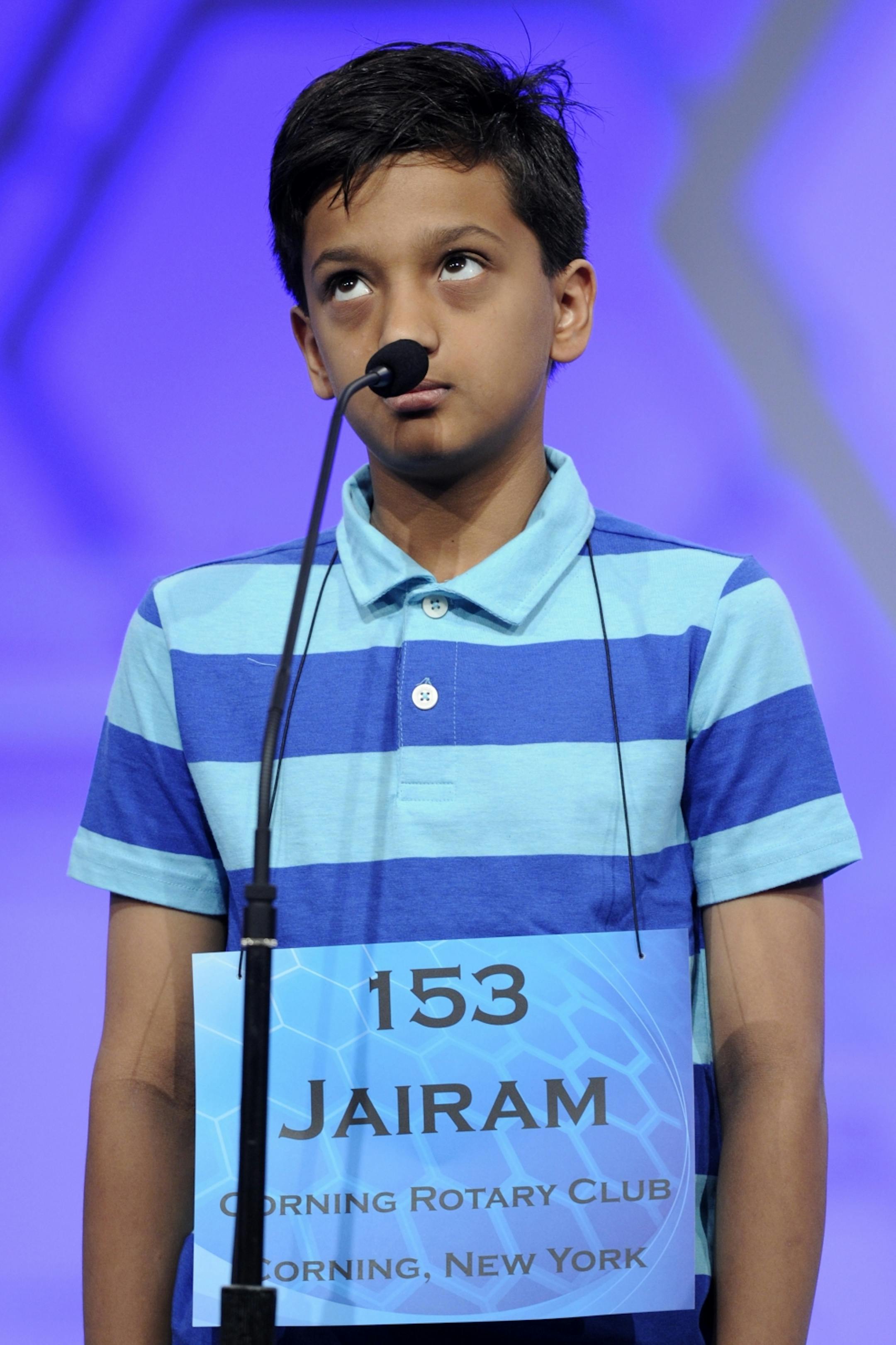 Jairam Hathwar, 12, of Corning, N.Y., spells the word "harpsichord" during the2015 Scripps National Spelling Bee in Oxon Hill, Md., Wednesday, May 27, 2015.