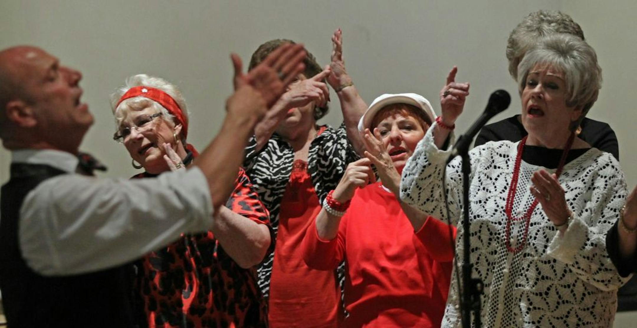 Alive & Kickin Director Michael Matthew Ferrell led a performance for seniors at the Minnetonka Community Center.a