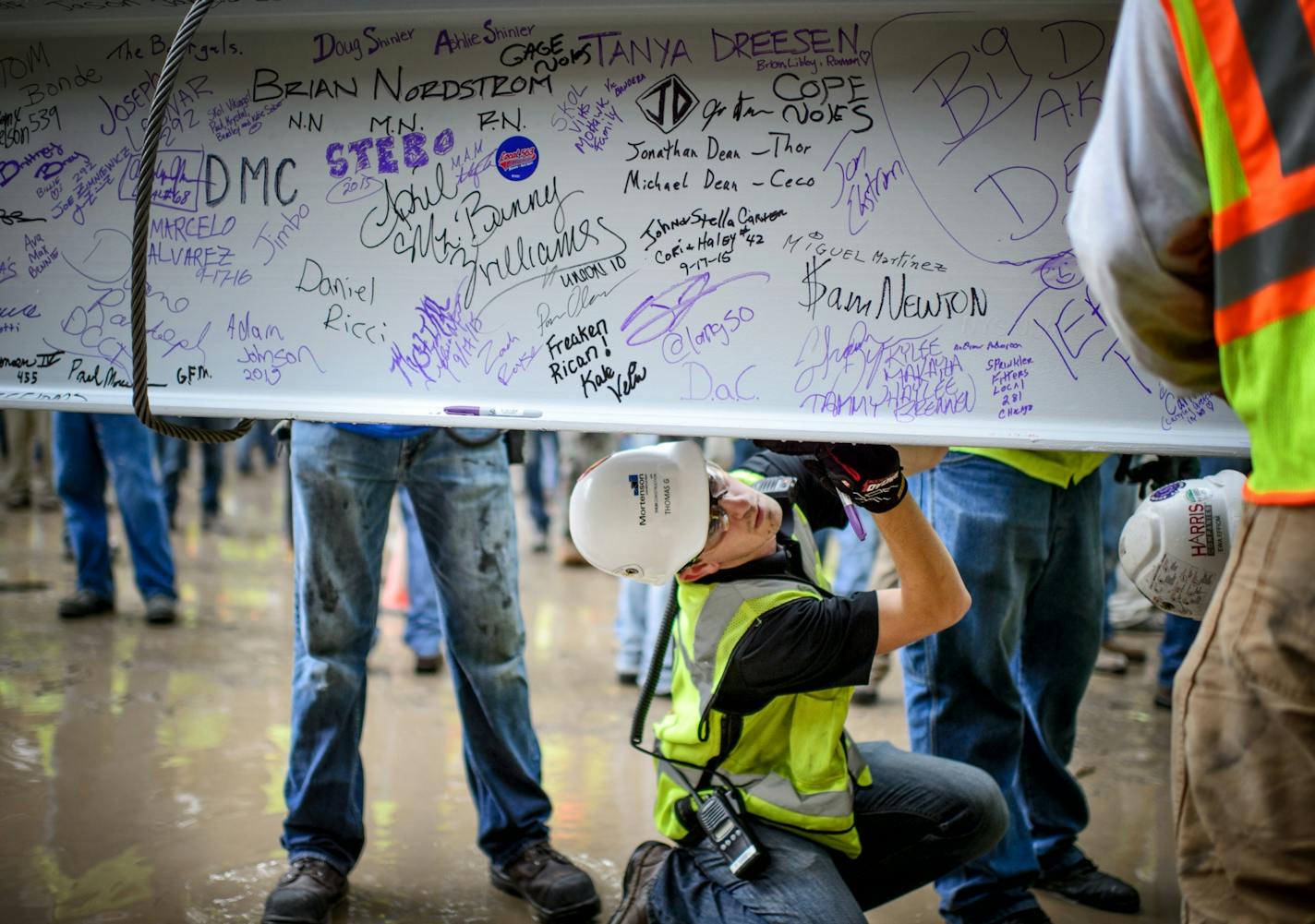 Workers searched for pen space to sign the beam.